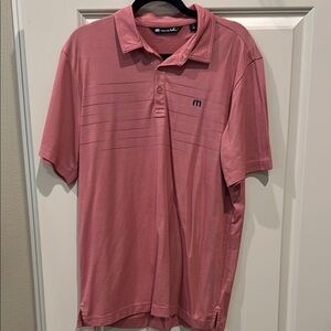Men's large pink Travis Mathew golf polo. Navy and grey stripes across chest